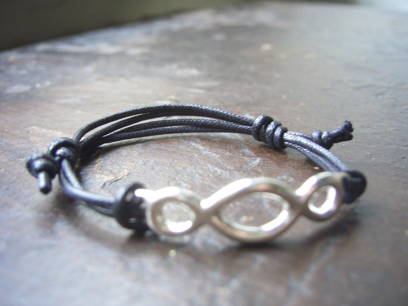 Third Paradise silver bracelet with black Cala Corallo cord cover